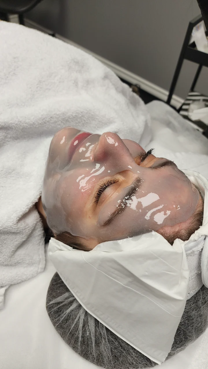 A translucent gel mask resting on the face.
